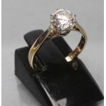 A SOLITAIRE DIAMOND RING, the brilliant cut stone of approximately 0.7cts, claw set to a plain