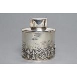 A TEA CANISTER, maker's mark rubbed, Chester 1935, of oval form, chased in the Dutch style with a