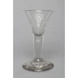 A JACOBITE WINE GLASS, mid 18th century, the trumpet bowl engraved with a rose and thistle on a