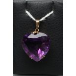 AN AMETHYST HEART PENDANT in 9ct gold frame with plain bale (Est. plus 21% premium inc. VAT)