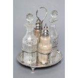 A GEORGE III FOUR BOTTLE CRUET, possibly by Joseph Scammell, London 1794, the plain oval stand