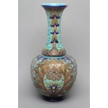 A BURMANTOFTS FAIENCE VASE, early 20th century, of baluster form with tall flared neck, tubelined
