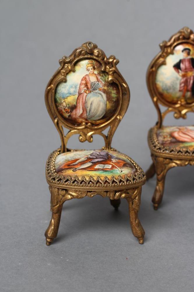 AN AUSTRIAN GILT METAL AND ENAMEL MINIATURE BOUDOIR SET, painted in colours with figures in 18th - Image 2 of 6