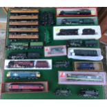 A collection of diecast model trains and carriages from brands including Hornby and Lima. Lot