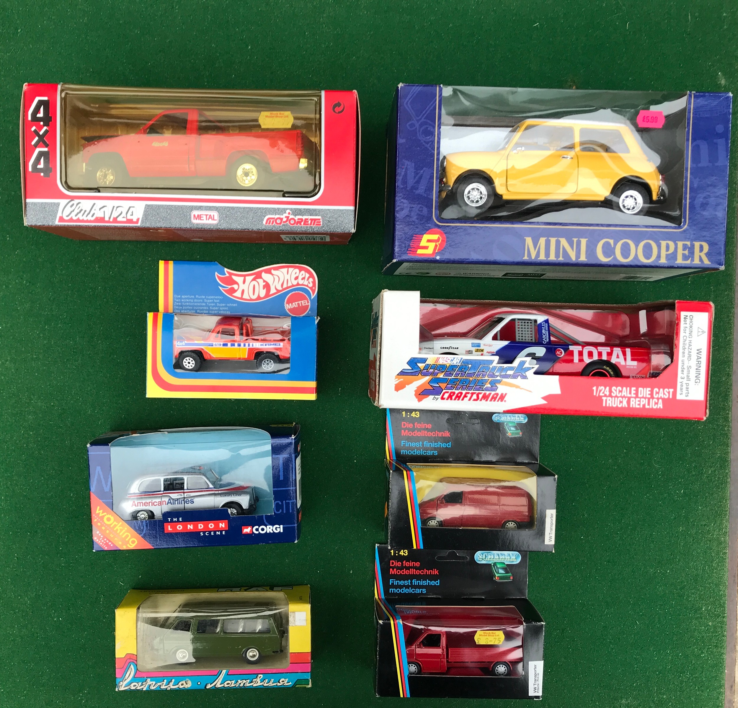 A mixed lot containing 8 boxed metal diecast vehicles. Lot includes 1070 Schabak VW Transporter,