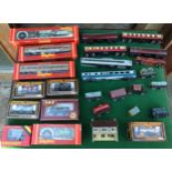 A collection of diecast model trains and carriages from Hornby, Airfix and Palitoy, including a LNER