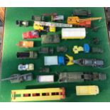 A collection of Dinky Diecast vehicles to include 965 Rear Dump Truck, 674 Austin Champ, 641 Army