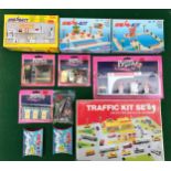 Lot containing boxed transport accessories from brands Majorette and Barton's Motoplay. Items