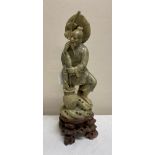 Carved jadeite figure of a fisherman. 31cm.Condition ReportGood condition.