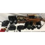 A collection to include Olympus OM10 with lenses and accessories, Olympus Superzoom 110, Minolta