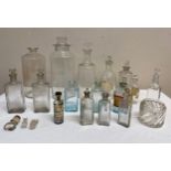 Selection of various chemist bottles and jars, majority clear. Tallest 25cm h. Provenance: Bratley