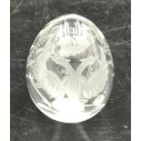 A clear cut glass Faberge egg with sticker to bottom. 6 h x 5cm w.Condition ReportGood condition.