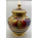 A Royal Worcester porcelain potpourri vase with pierced corners and inner lid by Brian Leaman and