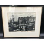 A framed ink print of industrial dock scene with warehouse. Unsigned. Picture 24.5 x 34.5cm. Frame