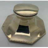 A silver inkwell with glass liner. Birmingham 1913 A & J Zimmerman Ltd. Total weight 476gm. (