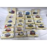 Twenty one boxed Corgi die cast models of buses, double-deckers, coaches and trams.Condition