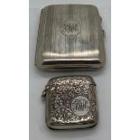 Silver cigarette case Birmingham 1918 J C Ltd together with a silver vesta case Birmingham 1921 with