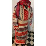 Vintage Russian folk costume to include silk skirt, apron, shirt headdress together with a silk
