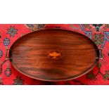 An Edwardian mahogany and inlaid galleried tray with brass handles. 62 x 35cm.Condition ReportSome
