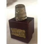 A silver thimble depicting ER and a crown. H C & S. Birmingham 1952. Weight 4gm.Condition