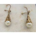 Pearl drop earrings set in 9ct gold.Condition ReportGood condition.