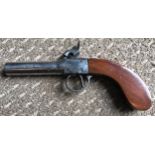Percussion single barrel pistol, turn off barrel, 6.5cms, marked to barrel, wooden grip, overall
