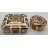 Two Royal Crown Derby lidded jars No. 1128 , one oblong, 10 x 12cm, one round Old Imari pattern.