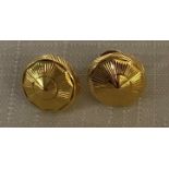 A pair of 22ct gold circular stud earrings with engraved design to front. 1.3cm d. Weight 3.7gm.