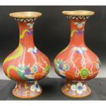 Two Cloisonne vases 19cm h.Condition ReportSlight knock and loss to underside of neck to one vase.