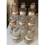 Eight 19thC pharmacy chemist glass bottles for solids, 3 x 25cm h, 5 x 19cm h. Provenance: Bratley