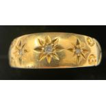 An 18 ct gold ring set with 3 diamonds, Size O. Weight 2.9gm.Condition ReportSurface scratches.