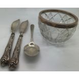 A silver topped glass sugar bowl Birmingham 1901, a silver spoon Sheffield 1895 Atkin Bros and 2