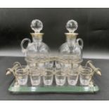 A good quality glass and hallmarked silver liqueur set by Mappin Bros. London 1899, consisting of