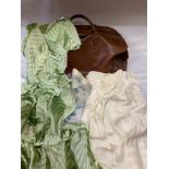 A vintage brown leather suitcase contents to include a 1930's silk velvet bias cut dress. Petite