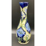 Moorcroft trial tall blue floral vase with butterflies. 42cm h. Circa 2005. Monogrammed to base MP