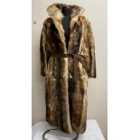 A long length vintage wolf fur coat with suede belt approx. Size 12. Length from shoulder to hem