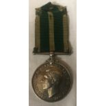 WWII Royal Navy medal with ribbon named 19540 A. G. Elliott LSM RNR.Condition ReportDents to side