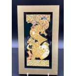 A Moorcroft framed plaque depicting a golden seahorse, monogrammed to reverse LBE and DS. 20 x