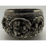 A 19thC Burmese silver bowl chased in high relief with peacock engraved to base. 15cm d. weight