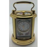 Miniature Halcyon Days Enamels brass and enamel carriage clock. 8.5cm h.Condition ReportUntested,