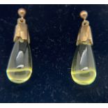 Peardrop citrine earrings with yellow metal mounts. Just under 3cm l. Butterfly backs 9ct gold.