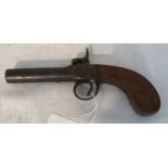 Percussion cap fired single barrel pistol, turn off barrel 2 and 5/8 length, calibre approx .44.