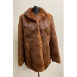 A coney fur jacket size 14, approx. 72cm length from shoulder to hem.Condition ReportGood