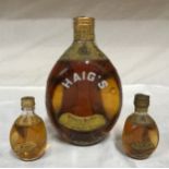 A Haig?s Dimple Scots large bottle of blended whiskey 20cm and 2 x miniature bottles 9cm. Mls
