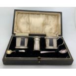 A boxed silver cruet set Birmingham 1934 BBS Ltd (Barker Brothers silver Limited) with blue glass