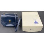 A 1980's Burberry navy double sided handbag in original box. Marked "Vittora". Checked material to