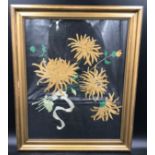 A gilt framed needlework panel of Chrysanthemums. 49 x 39cm, frame 59 x 49cm.Condition ReportMinor