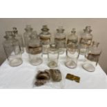 Eleven various glass chemist bottles to include 5 without labels tallest 25cm h and 6 with labels