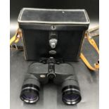A pair of Swift binoculars model no 721 classic. 80 x 40 with leather case.Condition ReportLight