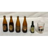 A Guinness collection to include 4 x miniature brown glass bottles with 2 label designs 8.5cm, a
